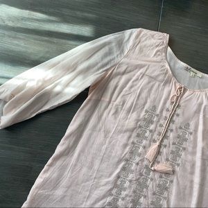Pale pink blouse with silver detail. Laffaire LG